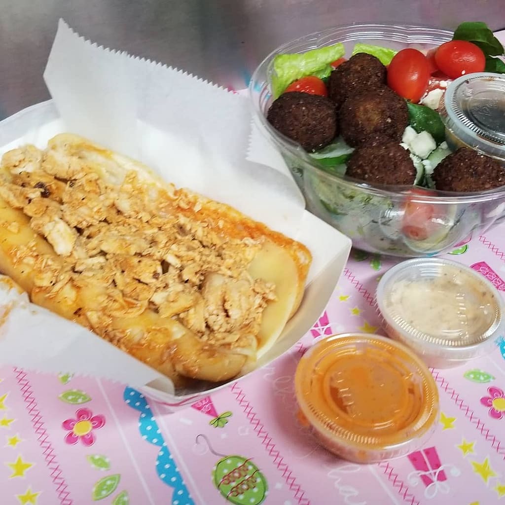 Garyssteaks Food Truck Catering in Hudson & King falafeel sauce salad chickenseak