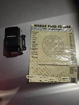 citywide permit picture with a location GPS device